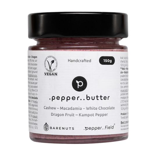 Kešu máslo s makadamiovým oříškem, bílou čokoládou, drařčím ovocem a Kampotským pepřem (150g)